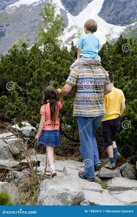 Children Hiking With Dad - 2 Stock Photography - Image: 1585412