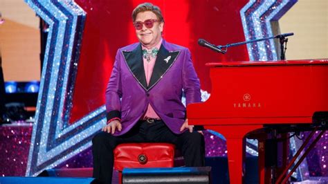 Elton John debuts new “Step into Christmas” holiday cards – 100.7 FM ...