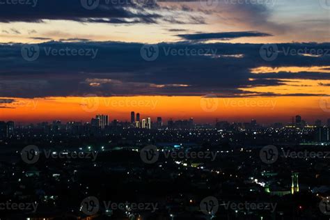 The skyline is a very beautiful sunset sky with an orange color in the ...