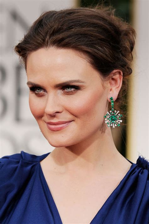 Emily Deschanel played with jewel tones, adding these brilliant-green earrings to her royal-blue ...