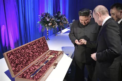 Kim Jong Un, Vladimir Putin exchange swords as dueling gifts