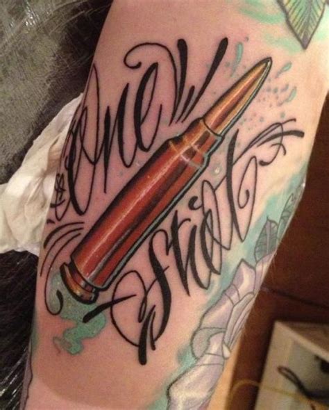 25 Latest Bullet Tattoo Images Pictures And Ideas | Bullet tattoo, Sailor jerry tattoos, Tattoos