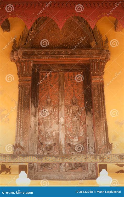 Ancient Laos Art Wood Carving On Church In Si Saket Temple In Laos ...