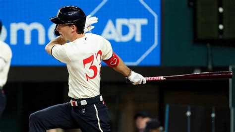 Rangers top prospect Evan Carter records single in first MLB at-bat, but Texas' playoff hopes ...