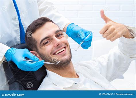 Patient at the Dentist Smiling Stock Image - Image of hygiene, people: 169671457