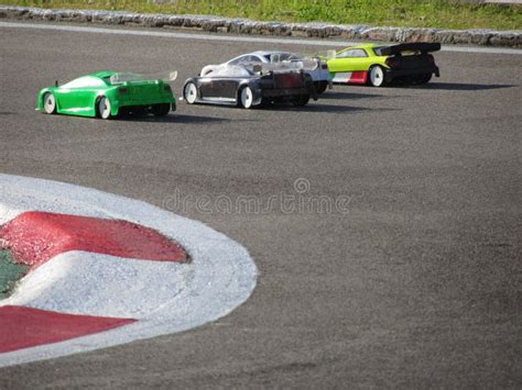 Small Radio Controlled Model Cars on the Track . Miniature Remote ...