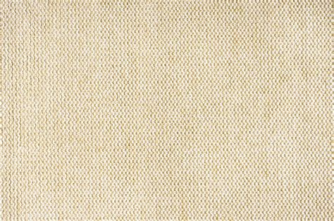 Premium Photo | Close up texture of beige coarse weave upholstery ...