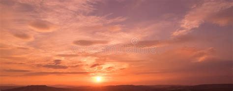 Sunset Scene with Sun Fall and Ray Light, Clouds in Background, Warm Colorful Sky Stock Photo ...