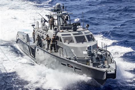 Sailors conduct the first-ever at sea refueling operation with USS Ashland and a Mark VI patrol ...