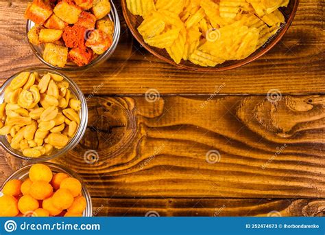 Different Snacks for Beer on Wooden Table. Top View Stock Image - Image of brewery, fried: 252474673