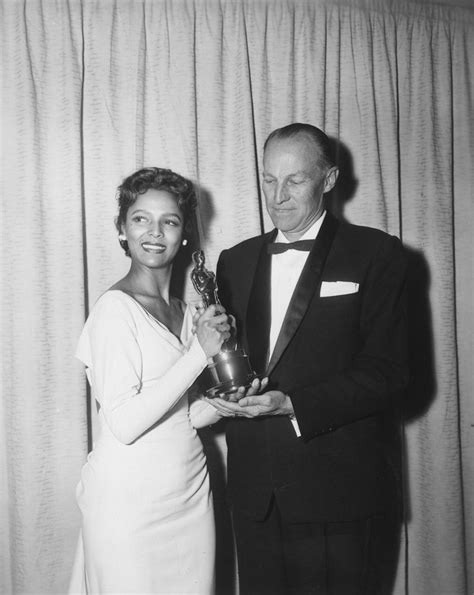 Dorothy Dandridge and John Fulton backstage at the 29th Academy Awards ...