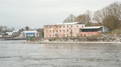 Old Decaying Buildings Along Narva River in Ivangorod Editorial Photography - Image of snow ...