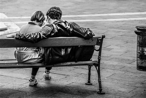 Free photo: Grayscale Photo of Two Person Sitting on a Bench - Adult, People, Trash can - Free ...