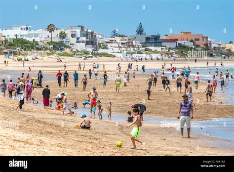 Tourists and beachgoers enjoy the sunny beaches of Bouznika, Casablanca-Settat, Benslimane ...