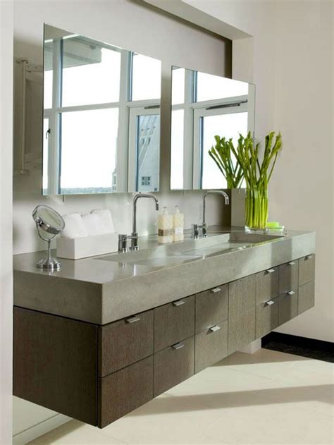 Simple-Mirror-above-Floating-Bathroom-Vanity-and-Fresh-Flower-Decor-beside-Double-Sink ...