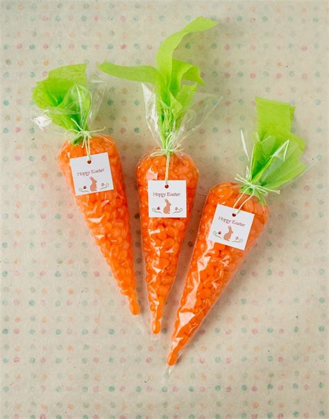 Every kid will love these carrots! We used orange jelly beans, cone shaped bags, green streamers ...