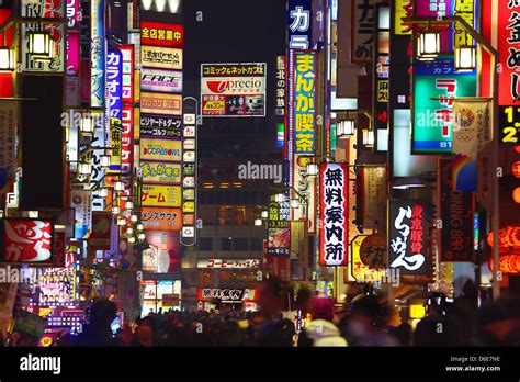 Night scene of street signs and lights in Shinjuku, Tokyo, Japan Stock ...