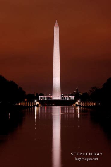 Photo: Washington Monument at night with a red sky. Washington, D.C., USA.