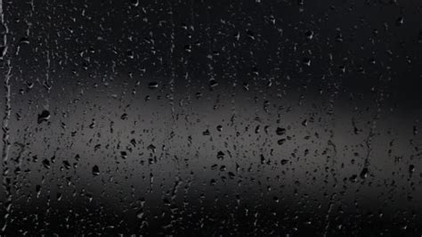 Black rain drops on window — Stock Video © Ivanna_Pliskova #156928068