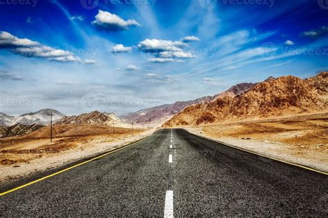 Road in Himalayas with mountains 1329554 Stock Photo at Vecteezy