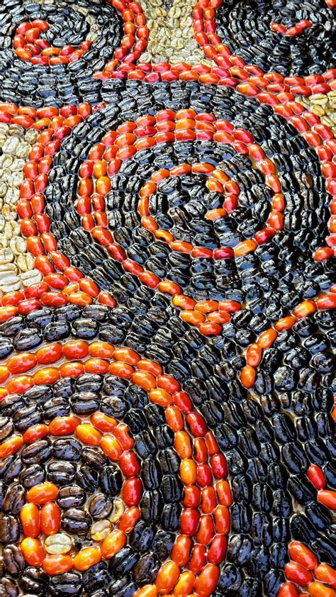 Spiral mosaic handmade with coffee beans, Huayruro seeds, grains, drift seeds and resin by ...