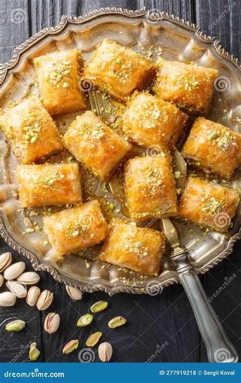 Baklava is a Layered Pastry Dessert Made of Filo Pastry, Filled with Chopped Nuts and Sweetened ...