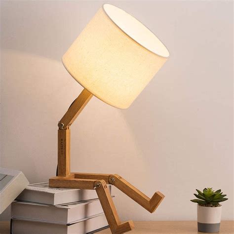 This Sad Man Adjustable Wooden Lamp Is How We All Currently Feel