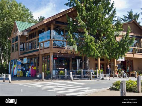 Exterior building of Wolf in the Fog restaurant and a surfer shop in ...