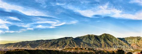 Panoramic image of Caracas city aerial view with El Avila National Park ...