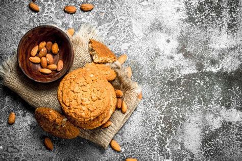 Premium Photo | Oatmeal cookies in a bowl with nuts.