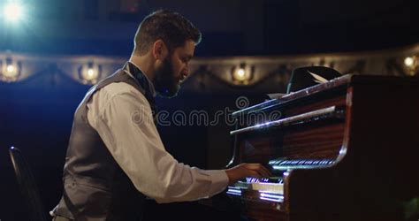 Man Playing Piano on the Stage Stock Image - Image of entertainment, music: 135514785