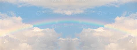 Beautiful rainbow with clouds and blue sky 38130079 Stock Photo at Vecteezy