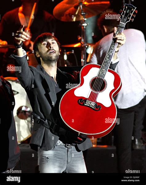 Dave Haywood of Lady Antebellum performing on stage at the HMV Hammersmith Apollo London ...