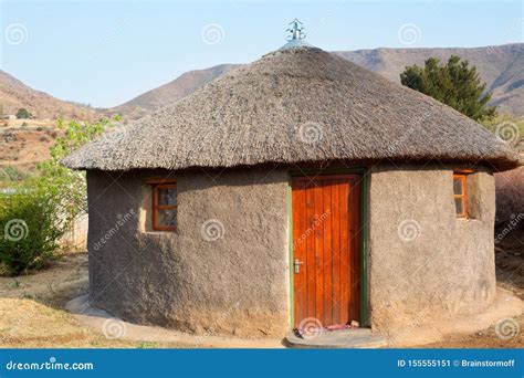 Traditional African Round Clay House with Thatched Roof in Village, Kingdom of Lesotho, Southern ...