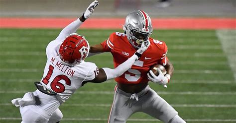 Garrett Wilson is chasing records, exceeding expectations at OSU