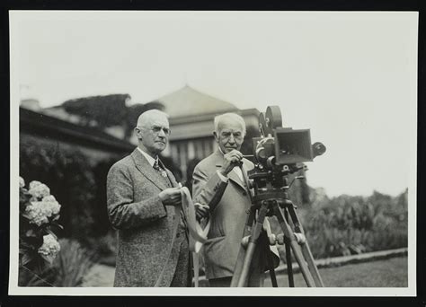 [George Eastman (left) and Thomas Edison with motion picture camera at Eastman's house in ...