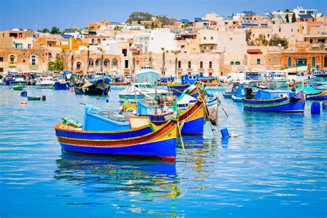 Marsaxlokk, Malta - Luzzu Boats Stock Image - Image of luzzu, boat ...