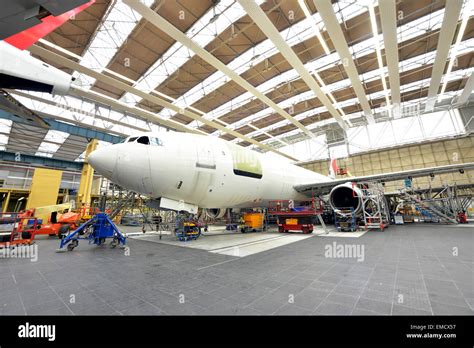 Airplane construction in a hangar Stock Photo - Alamy