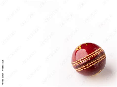 Red cricket ball isolated stock image. Stock Photo | Adobe Stock