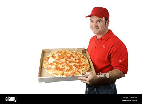 A pizza delivery man holding a hot fresh pepperoni pizza Isolated on white Stock Photo - Alamy