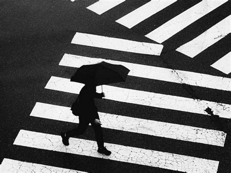 Premium Photo | Shadow of man walking on street