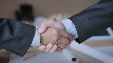 Manager Shaking Hands With Colleague Stock Footage SBV-329772565 - Storyblocks