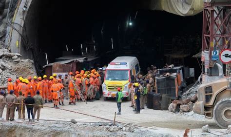 India tunnel collapse: Rescuers break through debris trapping 41 workers