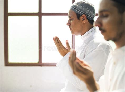 Muslim Men Praying Together in a Room Stock Photo - Image of therapy ...