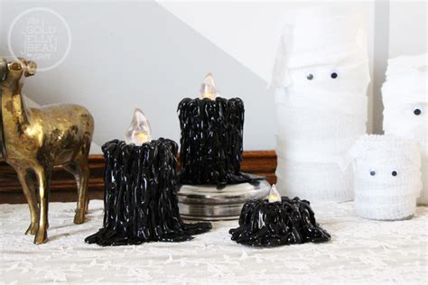 DIY Halloween Decor : Drippy Black Candles | The Gold Jellybean