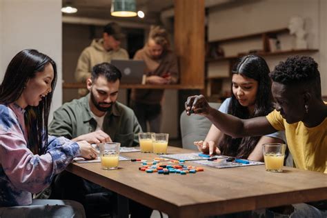 A Group of People Playing Board Game · Free Stock Photo