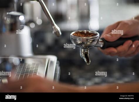 Barista using espresso machine Stock Photo - Alamy