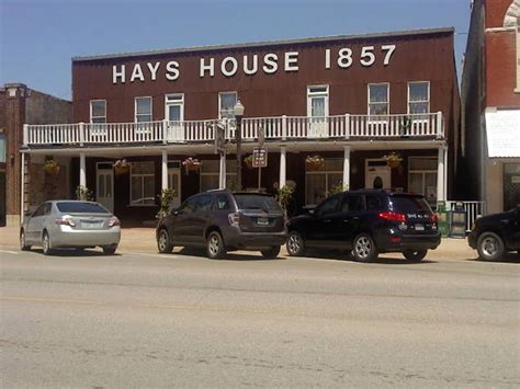 several cars parked in front of a building