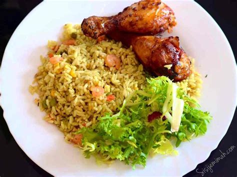 The Nigerian fried rice is a very colorful meal garnished with freshly ...