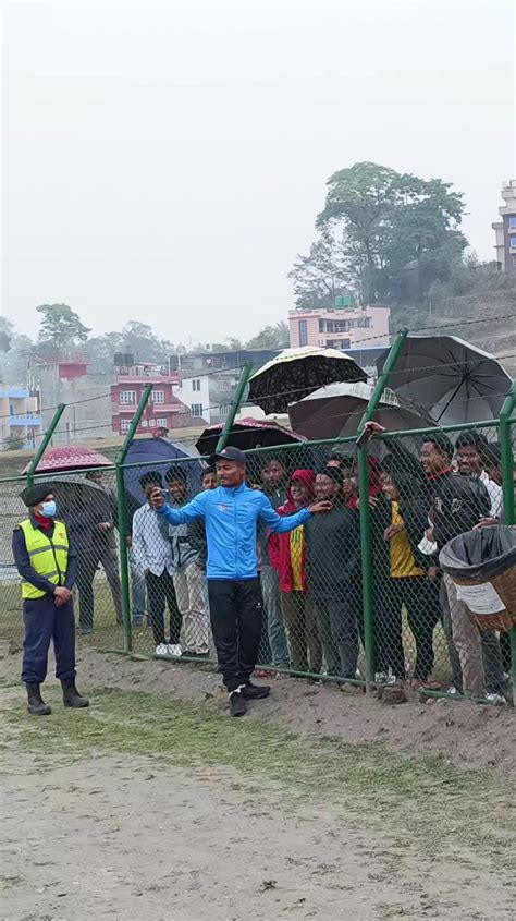 Rohit Paudel spending some time with fans at Mulpani Cricket Ground. 🙌 | cricnepal.com